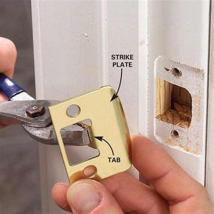 adjust door strike plate