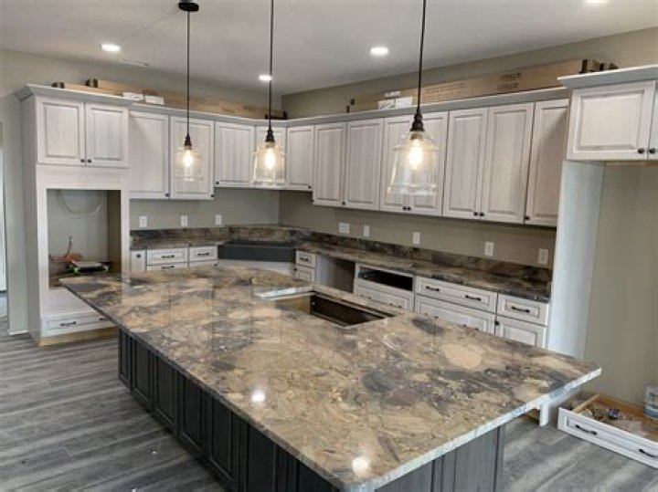 astoria granite with white cabinets