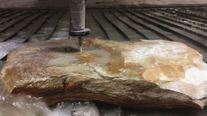 Can water jets cut stone?