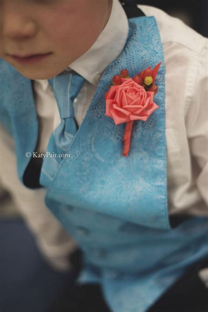 does ring bearer wear boutonniere