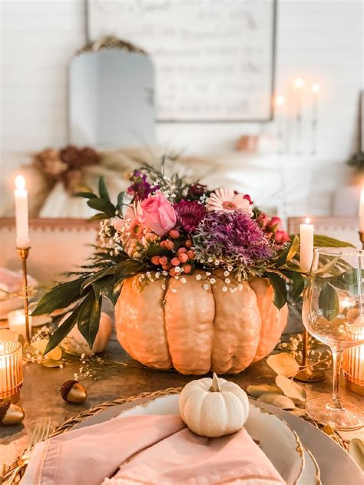 How do you arrange flowers in a pumpkin