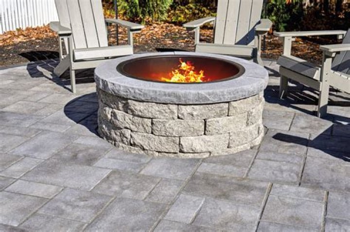 How do you build a stone fire pit?