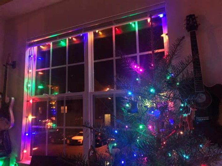 How do you hang Christmas lights in a window