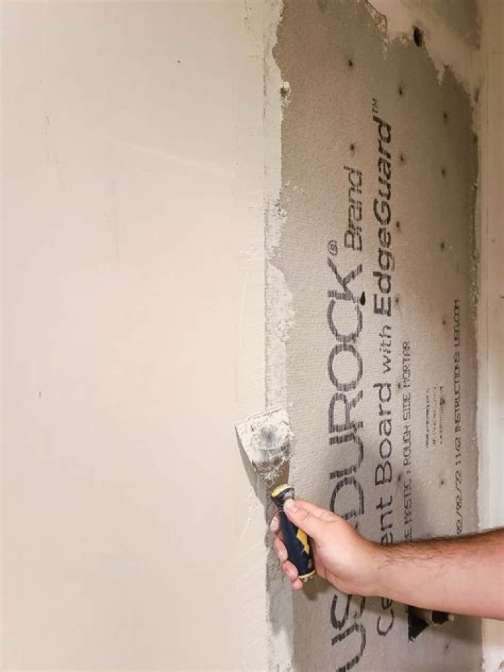 How do you install Durock cement board on the floor?