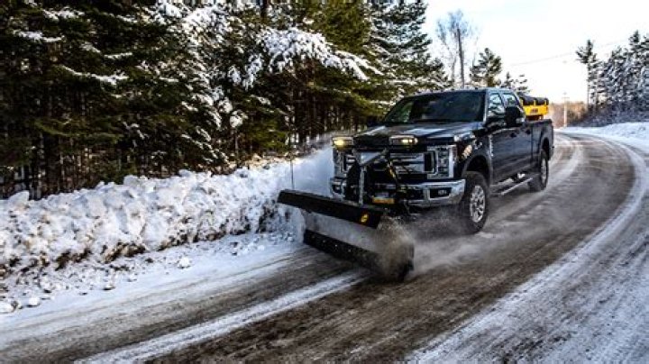 How do you plow snow on a gravel driveway