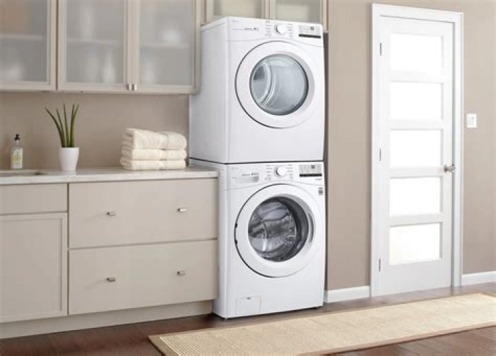 How do you reset a stackable washer and dryer?