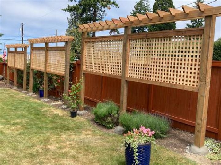 how high can a fence be with trellis