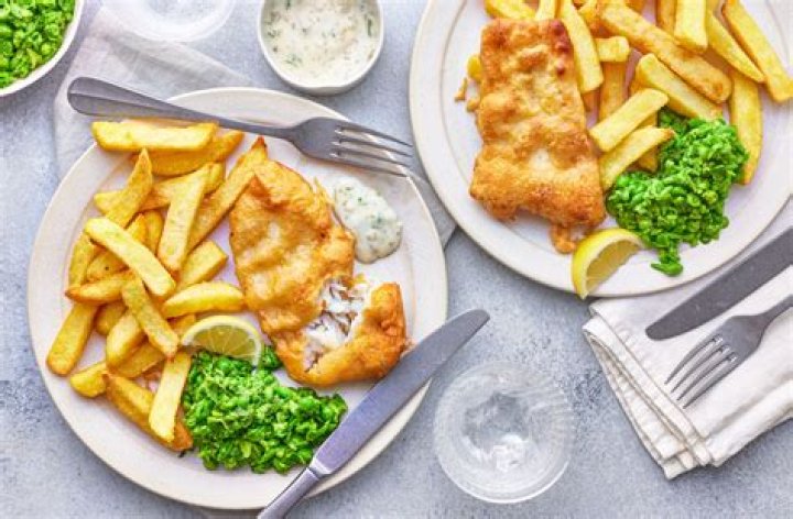 How many calories are in fish chips and mushy peas?
