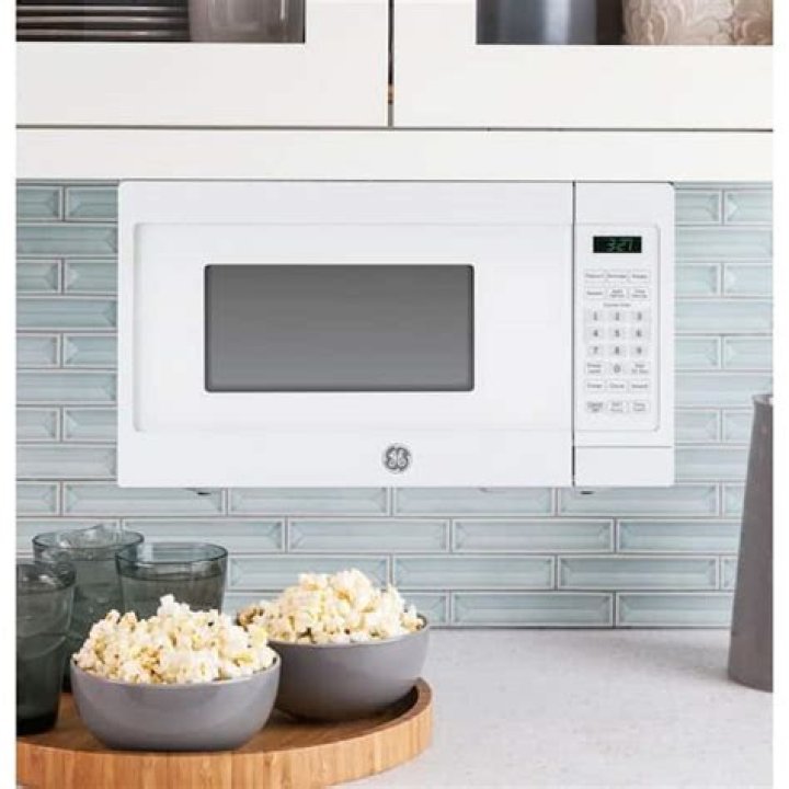 How many cubic feet is the GE Spacemaker XL microwave?