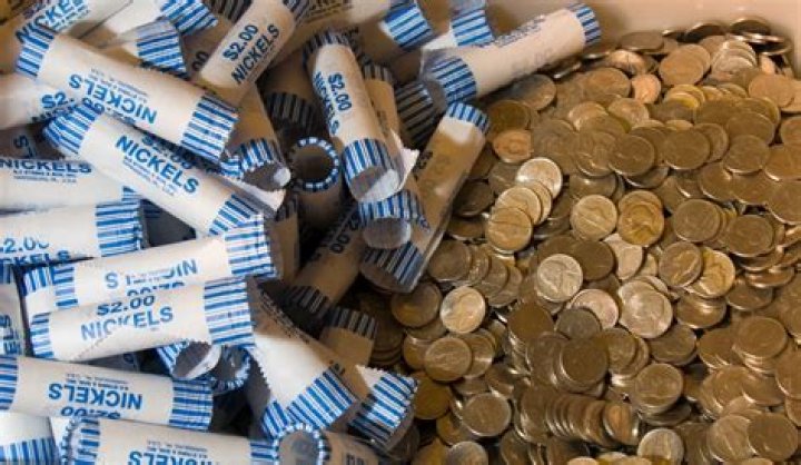 How many nickels is 300 grams?