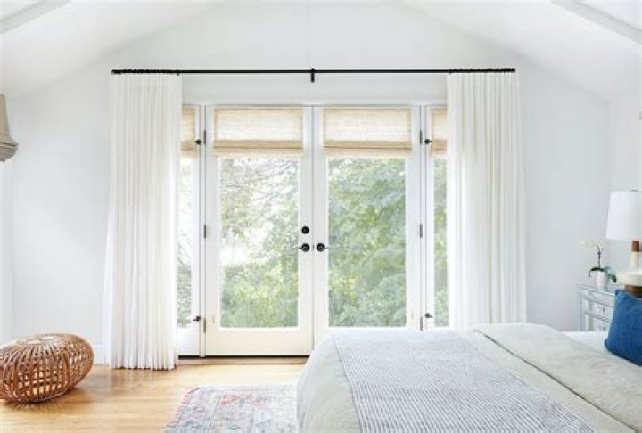 how to hang curtains over sliding glass door