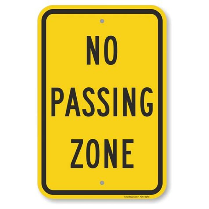 no passing zone sign