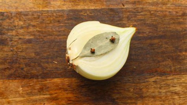 onion studded with cloves and bay leaf is called
