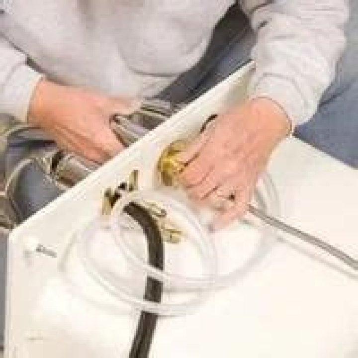 removing kitchen faucet mounting nuts