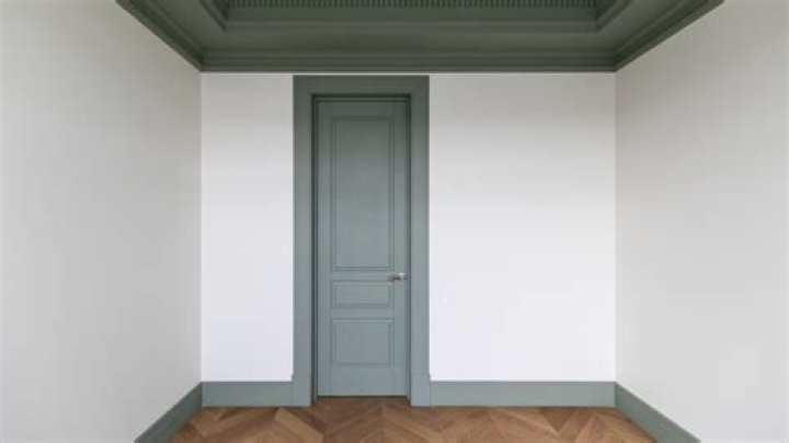 should doors match trim or wall