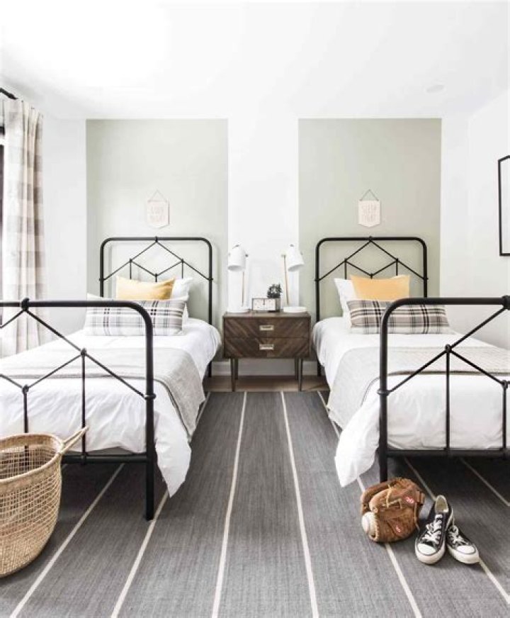 two twin beds in a small room