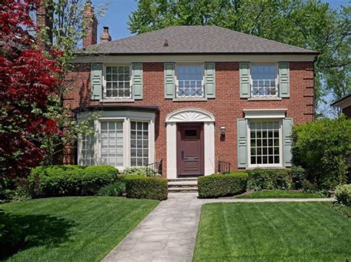 what color shutters go with red brick