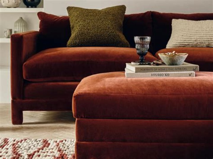 What colors go with a rust colored sofa?