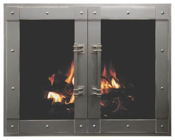 What is the purpose of Glass fireplace doors