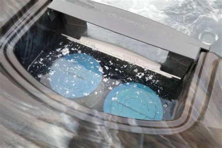 white flakes in hot tub