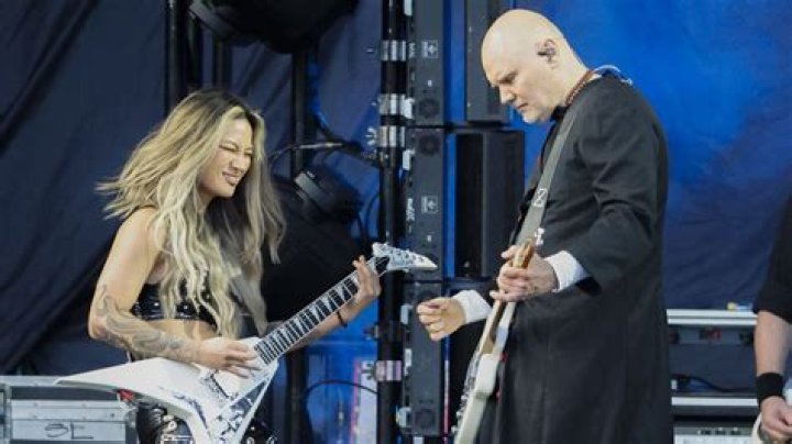 Who plays lead guitar for Smashing Pumpkins