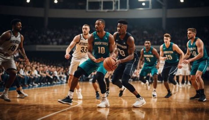 Why is basketball considered an invasion game